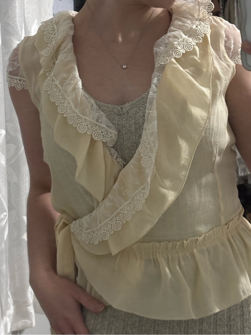 Laced ruffle neck blouse